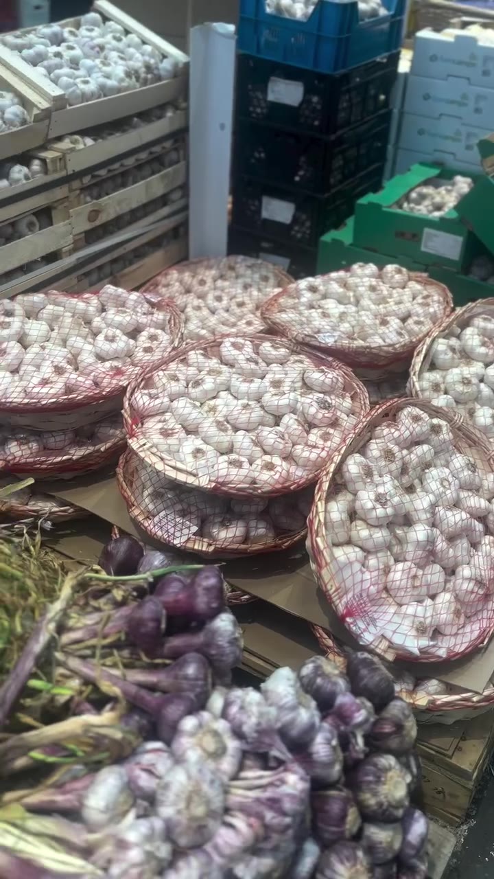 Garlic braids and baskets on the Rungis market floor